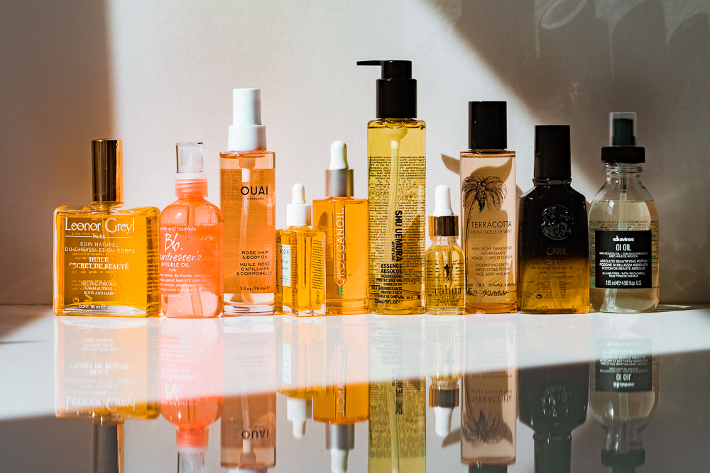 Hair oils lined up on a counter